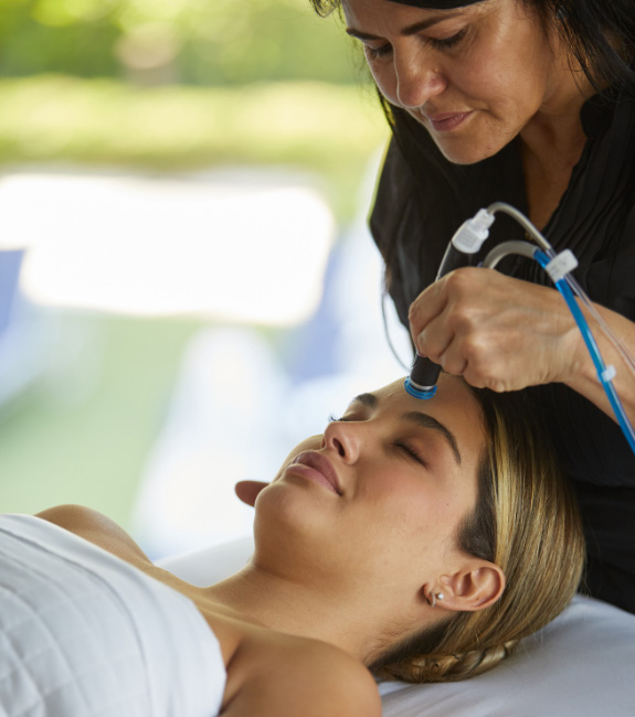 Woman receiving spa treatment in Miami